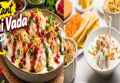 Homemade soft Dahi Vada topped with creamy yogurt, tamarind chutney, green chutney and Indian spices.